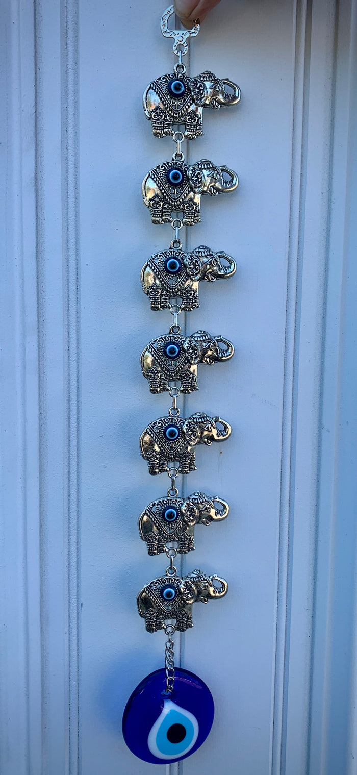 Evil eye with elephants wall hanging