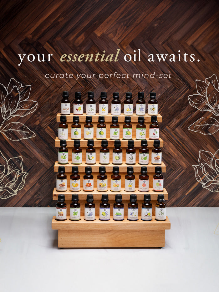 Rustic Strength - Scent Oil graphic depicting a display of 1oz oils with the caption "Your Essential Oil Awaits. Curate your perfect mind-set"