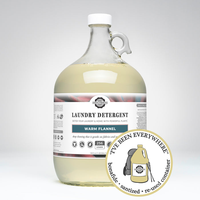 Rustic Strength, Laundry Detergent, 1 Gallon, Glass Jug, Warm Flannel, with image "I've been everywhere - Bonafide, Sanitized, Re-used Container"