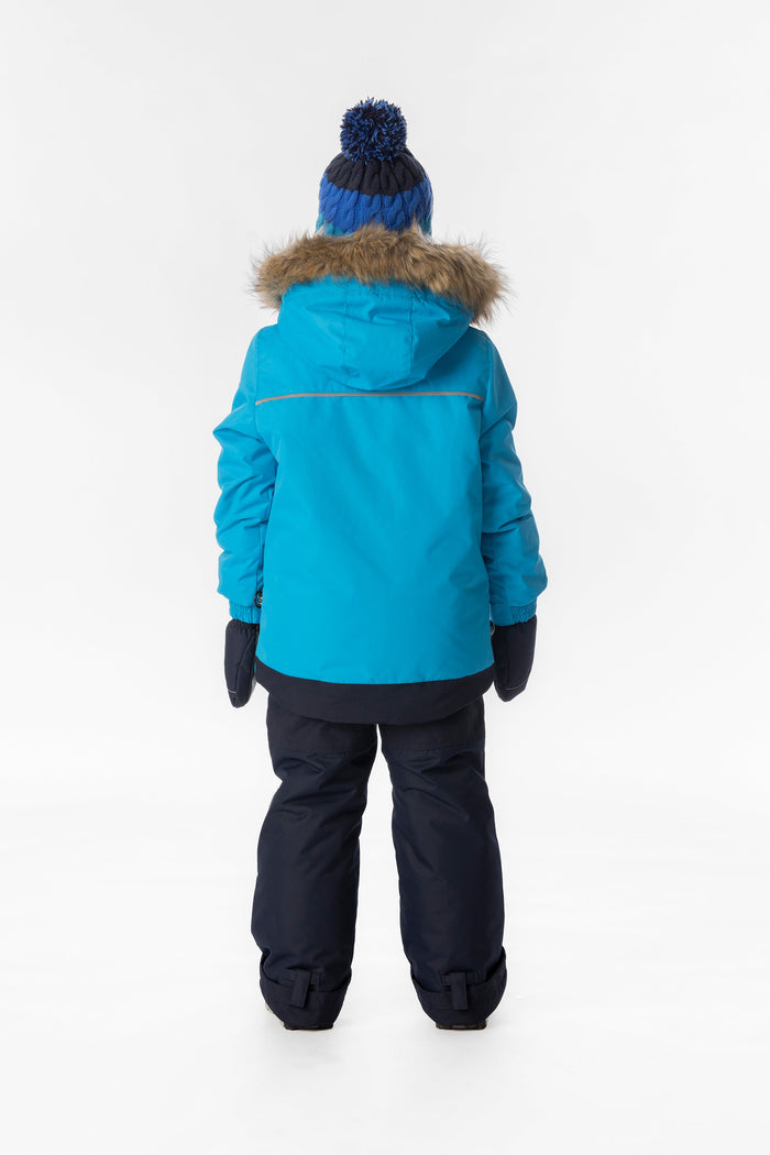 Child wearing the bright blue and navy Deux par Deux DISCOVER snowsuit, back view