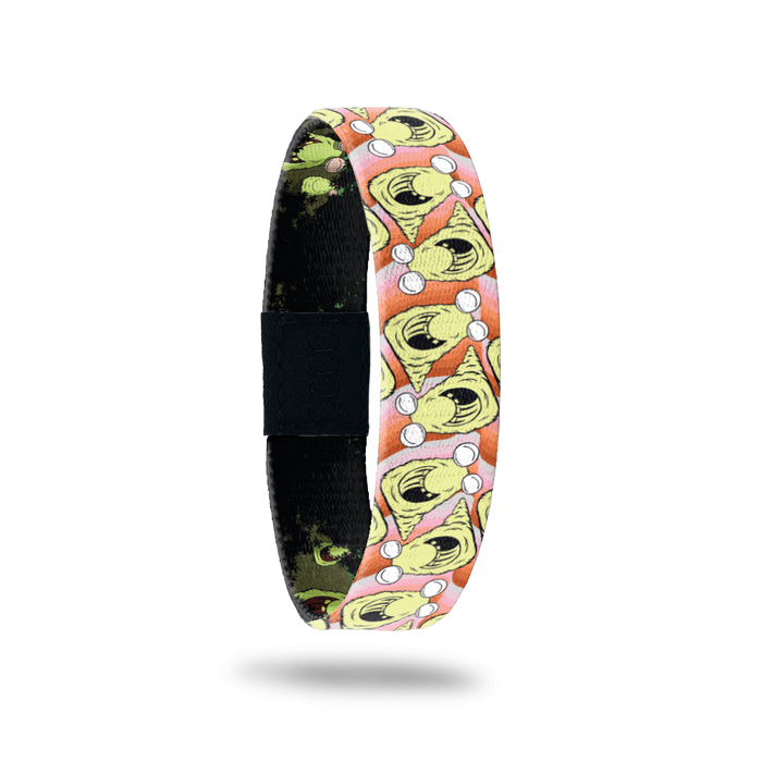 Product photo of the outside of 2020 - Day 12 - Hermy Highnote: orange and pink design with repeating green slug-like monster with white eyeballs
