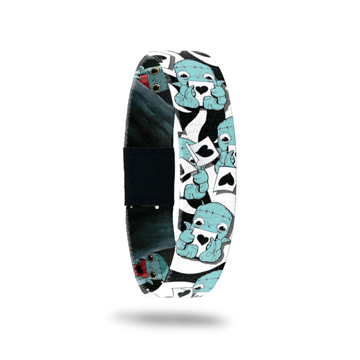 Product photo of the outside of 2020 - Day 21 - Frankie 8-Arms: black and white design with repeating light blue monsters with 8 arms holding a white piece of paper with a black heart on it