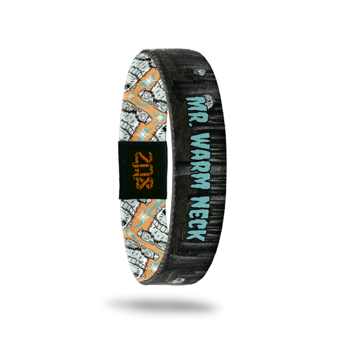 Product photo of the inside of 2020 - Day 29 - Mr. Warm Neck: gray and black forest design with furry, gray monsters and teal 'MR. WARM NECK' text