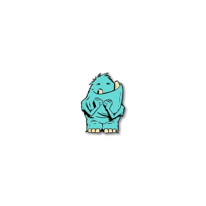 Enamel pin photo for 2020 - Day 3 - Oh Boy: furry, turquoise smiling monster with two teeth