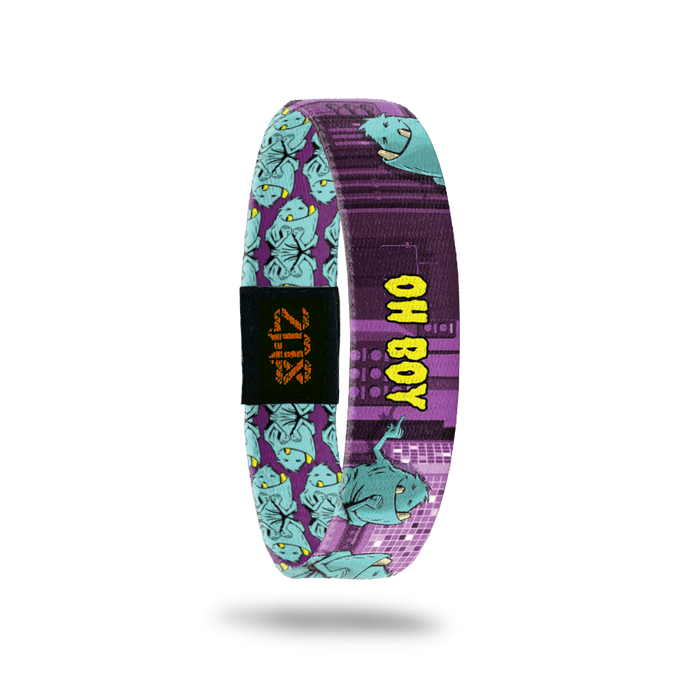2020 - Day 3 - Oh Boy: purple and black design with furry, turquoise smiling monsters with two teeth and yellow 'OH BOY' text