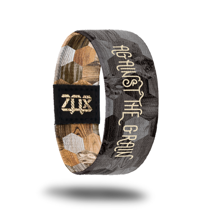 Inside design of Against the Grain : Against the Gain in light brown text. With grayscale version of outside design behind the text.