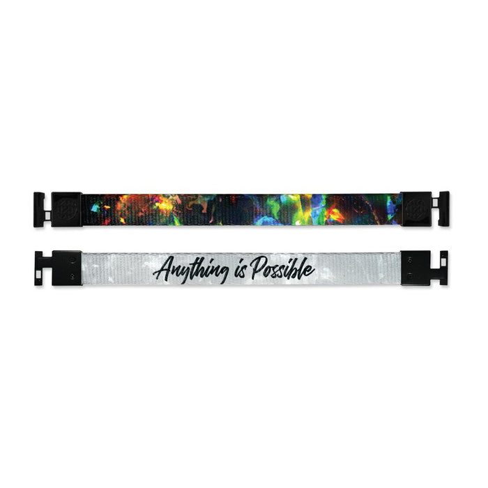 Shows outside and inside design for Anything Is Possible imperial with black aglet clasps. Top is outside design of a dark space with a few bright colors. Bottom is inside design with a faded white background and Anything Is Possible in black text