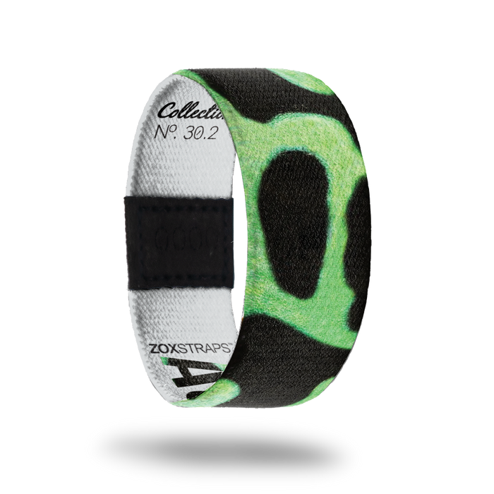 Auratus-Sold Out-ZOX - This item is sold out and will not be restocked. Solid black strap with neon green circular shapes. Inside is solid white and says Auratus.