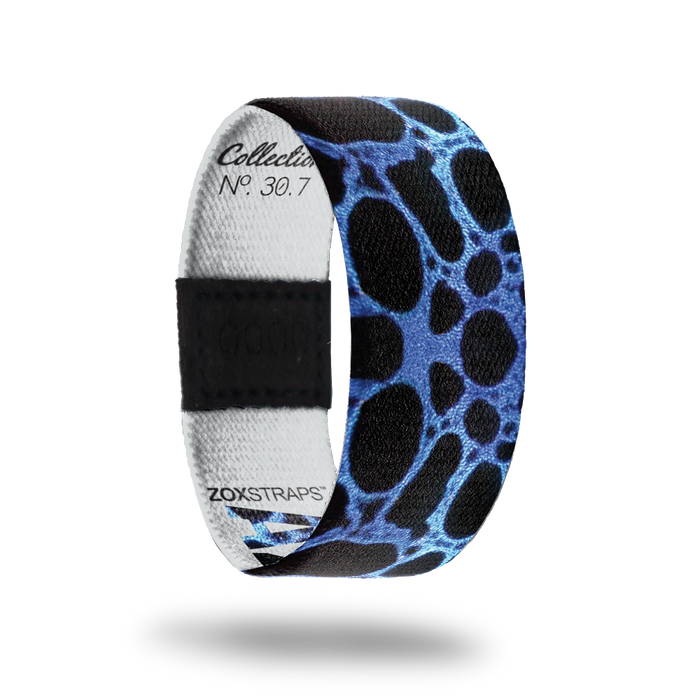 Azureus-Sold Out-ZOX - This item is sold out and will not be restocked. Black strap with blue circular design all over. Inside is solid white and says Azureus.