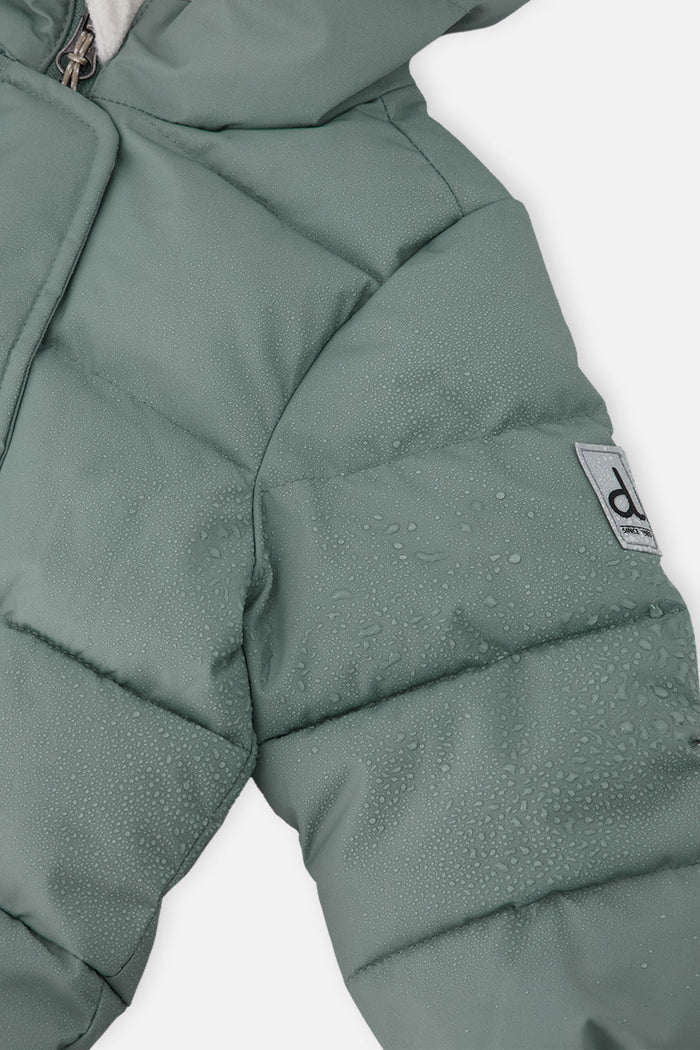 Deux par Deux sage green Baby Cloud snowsuit, close-up of the quilted sleeve