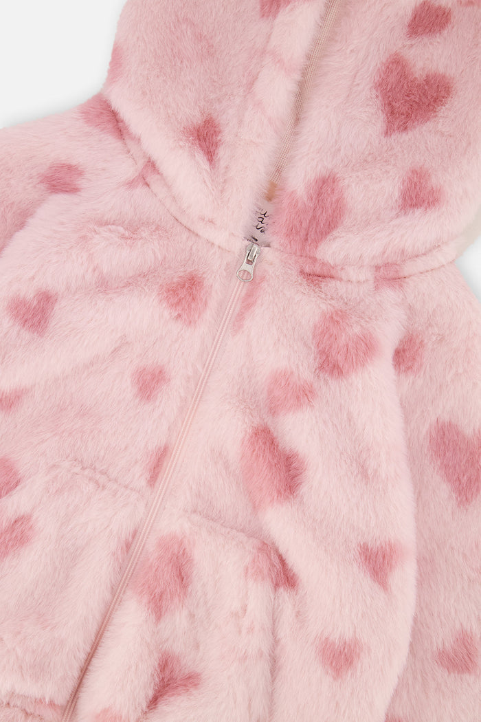 Close-up of the pale pink faux fur with jacquard hearts, hood, front zipper and kangaroo pocket