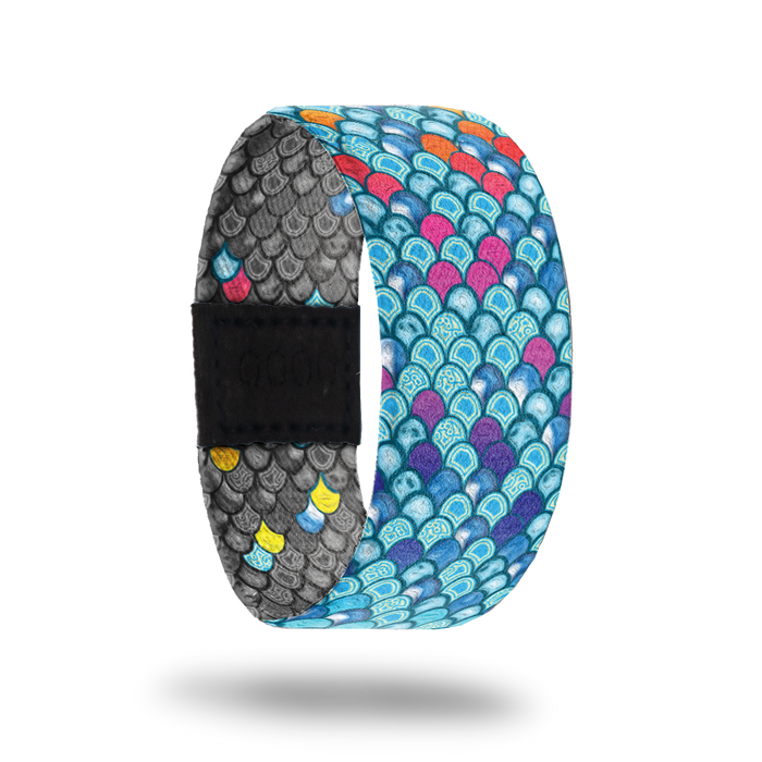 Be Kind-Sold Out-ZOX - This item is sold out and will not be restocked. Bright blue scales of a mermaid with random pink and orange ones. Inside is all gray scales with random colored ones and says Be Kind.