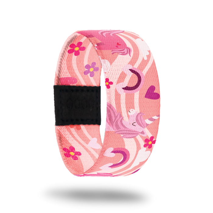 Outside design for Bestie. A pink background with a lighter pink wave that goes across the design. Rainbows and hearts in shades of pink and Unicorns in shades of pink and purple