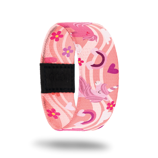 Outside design for Bestie. A pink background with a lighter pink wave that goes across the design. Rainbows and hearts in shades of pink and Unicorns in shades of pink and purple