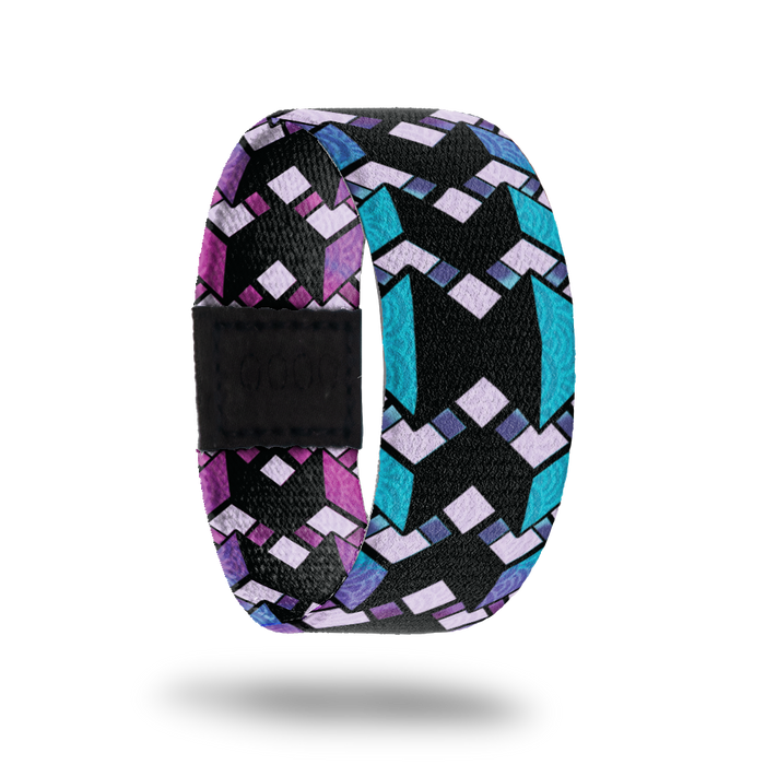 Between The Lines-Sold Out-ZOX - This item is sold out and will not be restocked. Solid black line in the middle with blue thin lines on the outside. Over top is zig zag purple designs. Inside is the same design but is purple and reads Between The Lines.