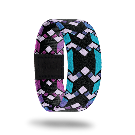 Between The Lines-Sold Out-ZOX - This item is sold out and will not be restocked. Solid black line in the middle with blue thin lines on the outside. Over top is zig zag purple designs. Inside is the same design but is purple and reads Between The Lines.