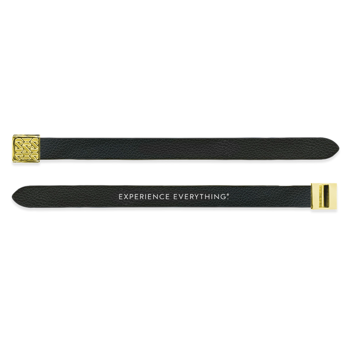 Outside Design of the V2 Imperial Black Solid: vegan leather material with printed on black background and gold buckle clasp. And Inside Design of the V2 Imperial Black Solid: vegan leather material with printed on black background with white text ‘Experience Everything’ and gold buckle clasp