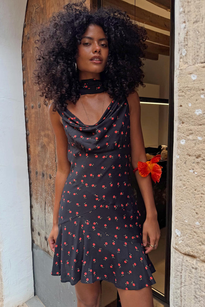 Black Rose Mini Sophie Dress featuring a red rose print, cowl neckline and matching neck scarf.