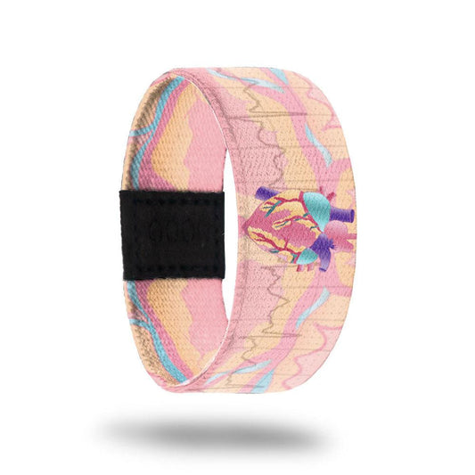 Outside design for Can't Stop The Beat: Background is  a pastel pink, blue, and orange with heart activity line with a heart at the center.