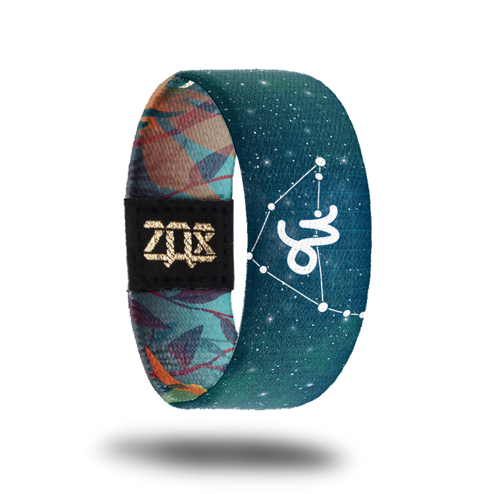 Inside design of Capricorn, a navy blue background with the star constellation and symbol for the astrological sign Capricorn in white