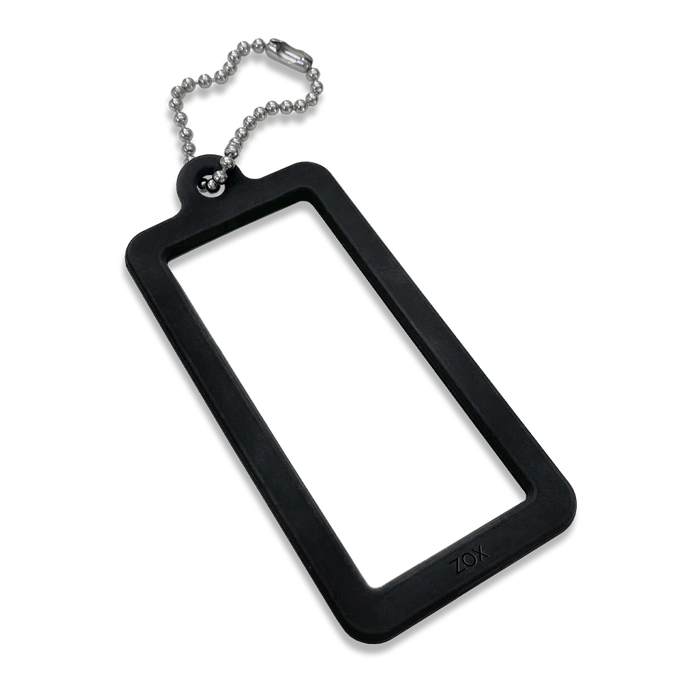 This is a cardlox. It is a silicone black rectangle with a clear poly sleeve to store the motivational card that comes with your ZOX. It has a metal key ring on the end to use for backpacks, keys, luggage, etc. The pack comes with 2.