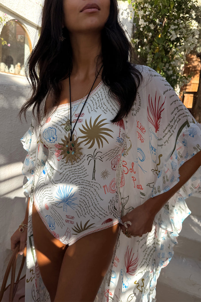 Cream Palma Kimono in the Sol De Palma print with hand-painted motifs and a frill hem, designed in London.