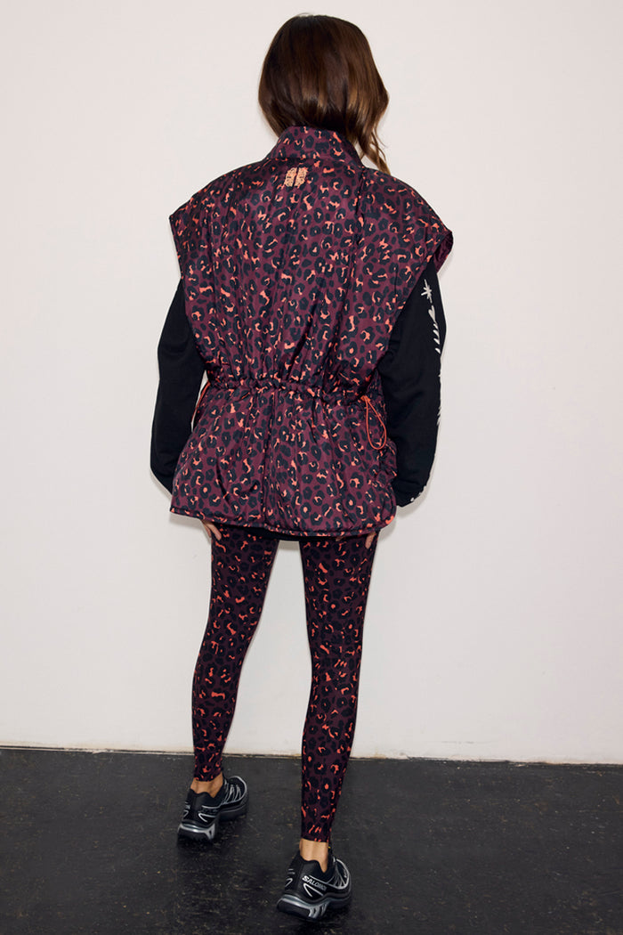Dark Leopard Gilet with a drawstring waist and iconic print, shown from the back over matching leopard leggings.