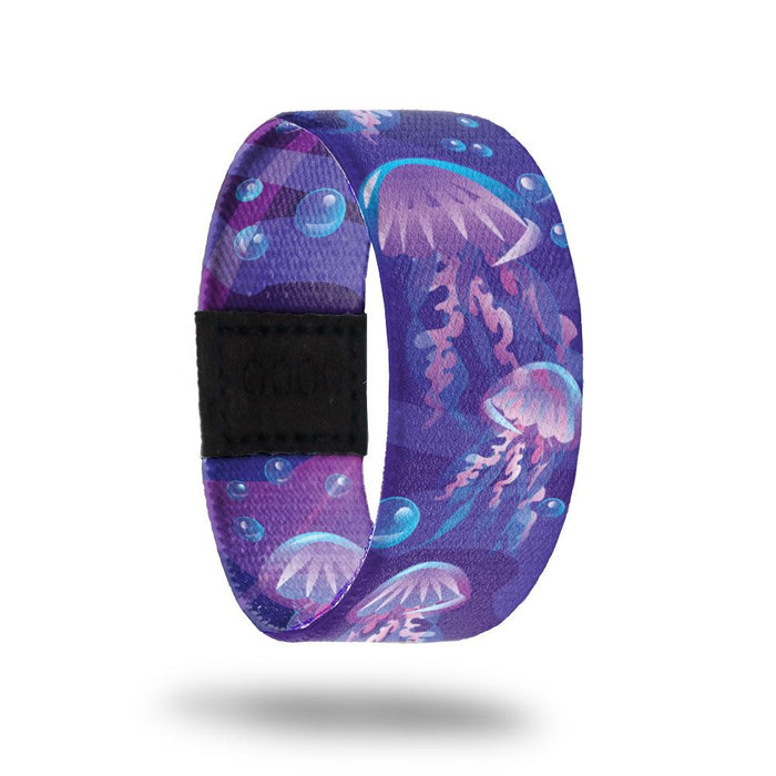 Outside design of Electric Bloom. Shades of purple background with blue illustrated bubbles and illustrated jellyfish that are purple with blue highlights