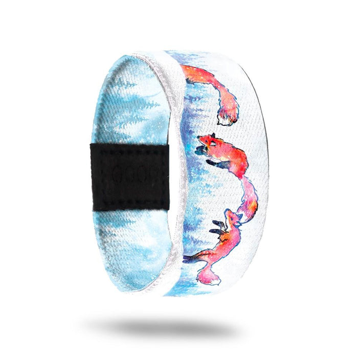Outside design for Euphoria. White background with small illustrated light blue trees and illustrated red-orange foxes across the design.