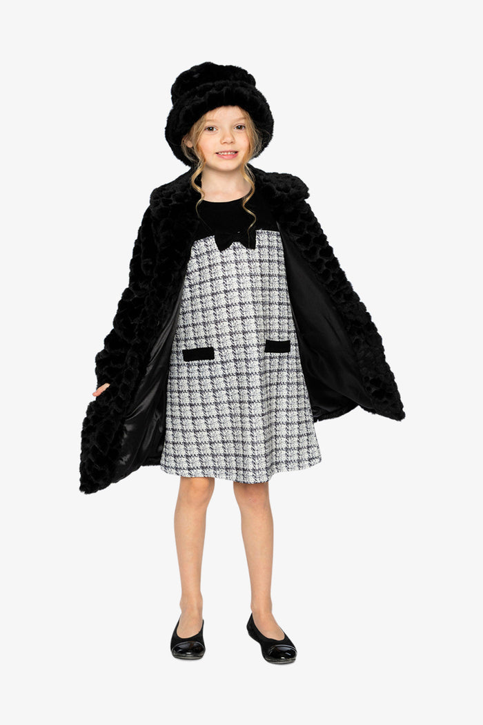 Girl holding open the black faux fur long coat to show the black lining, front view