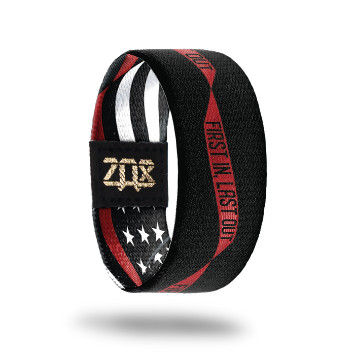 Inside Design of First In, Last Out. black background with red single ribbon running along the center with First In, Last Out in the ribbon in black