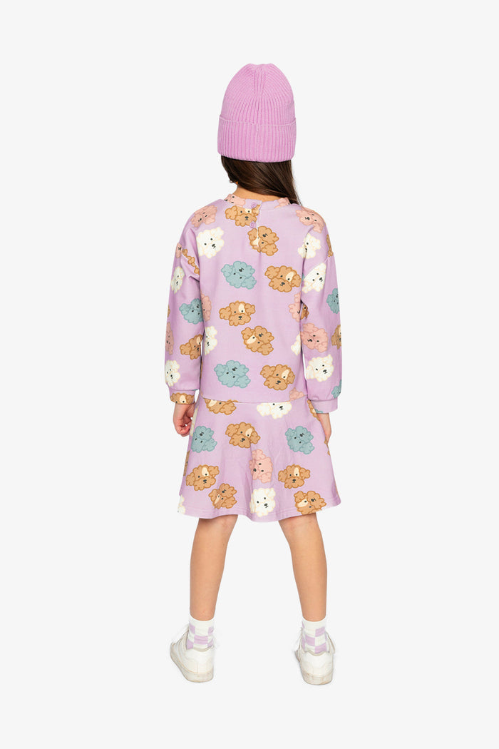 Lookbook: child wearing the Deux par Deux poodle print dress, third image