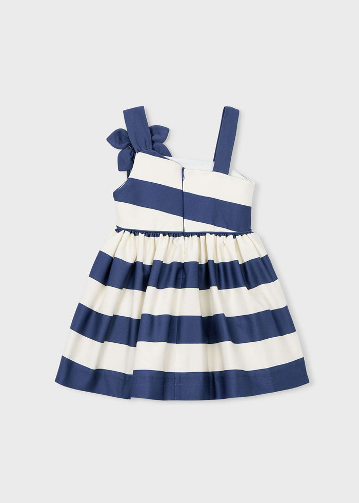 Back view of navy and ivory striped girls dress with zipper