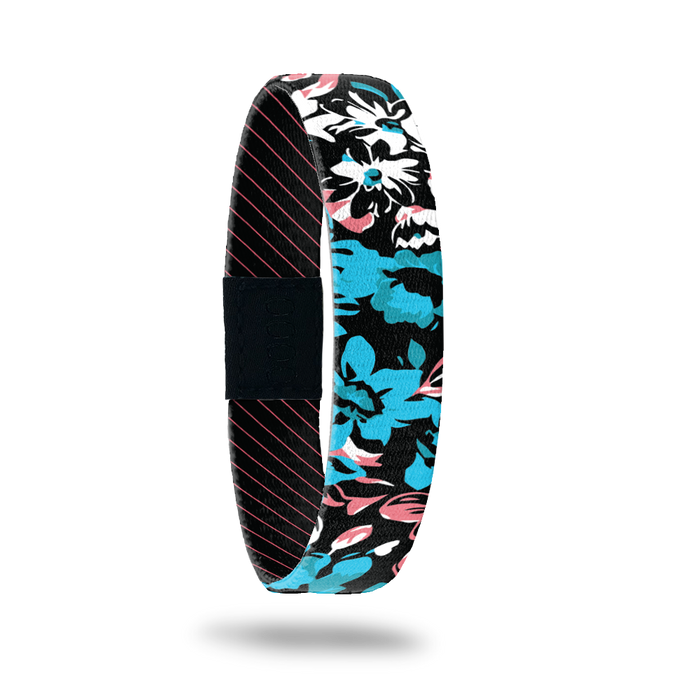 Product photo of outside design of hang loose with neon tropical flower print overlaying black background