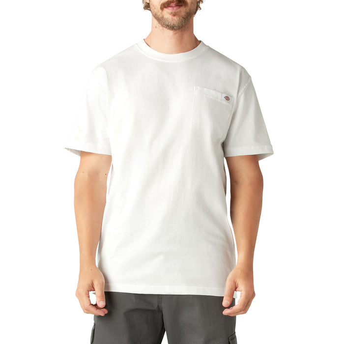White short-sleeve t-shirt with chest pocket and small red logo patch worn by man.