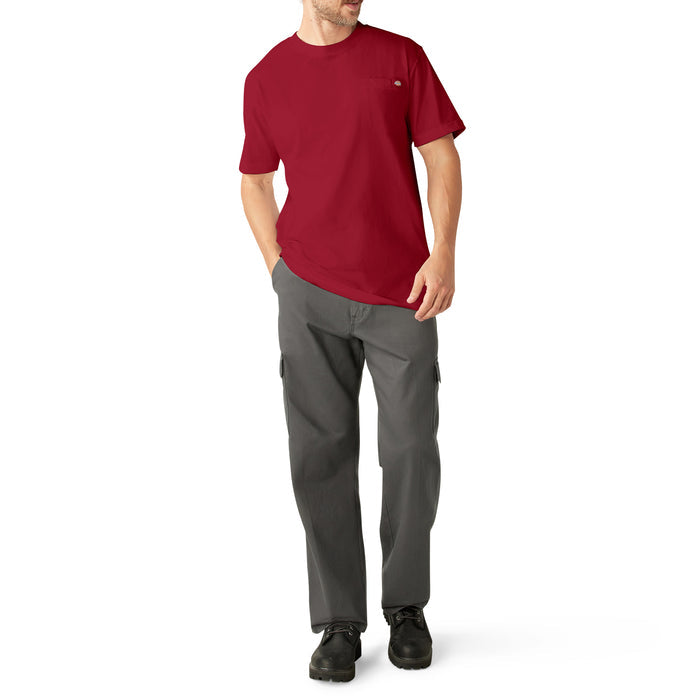 Man wearing burgundy short-sleeve t-shirt with chest pocket and gray cargo pants.
