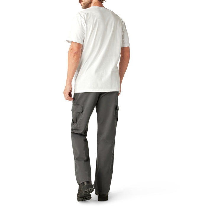 Man wearing cream short-sleeve t-shirt with chest pocket and gray cargo pants with side pockets, shown from back.