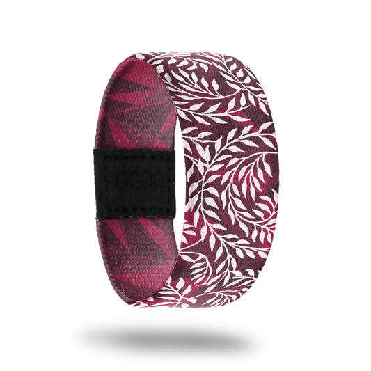 Outside design of Hope Over Fear. Red background with illustrated leafy vines across the design