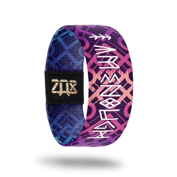 Inside design of I Am Enough. Dark purple background with light maroon lines intersecting and overlapping in a geometric pattern. In a unique mash up of runic and english text is I Am Enough in white at the center