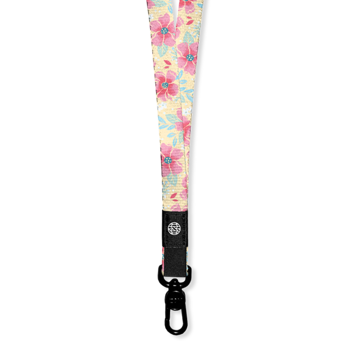 Lanyard with pale yellow base and pink flowers all over. The Inside says I Choose Joy and the lanyard has a metal clip for keys/cards. Each lanyard comes with 2 clips if you need to make a breakaway lanyard.