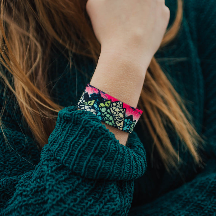 Lifestyle close up of In This Together on someone's wrist
