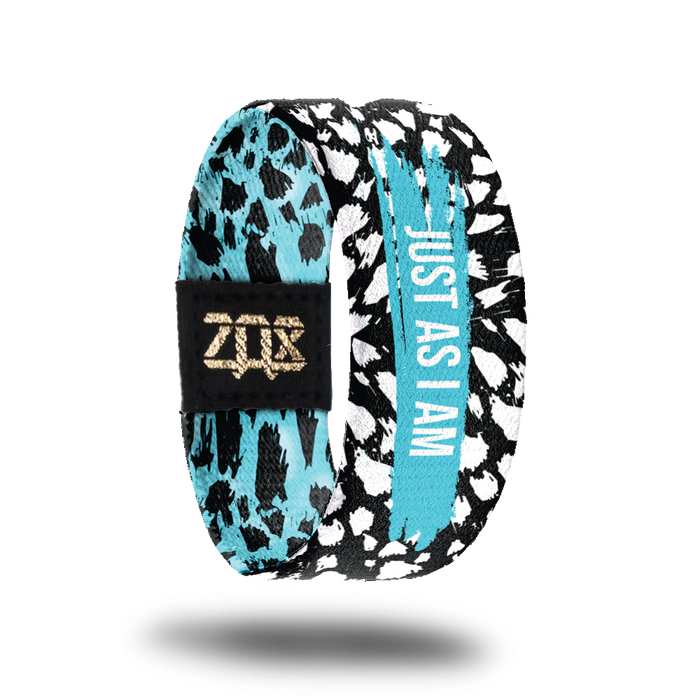 product photo of the inside of Just As I Am. It is showing the blue coloration of the text on the inside of the strap.