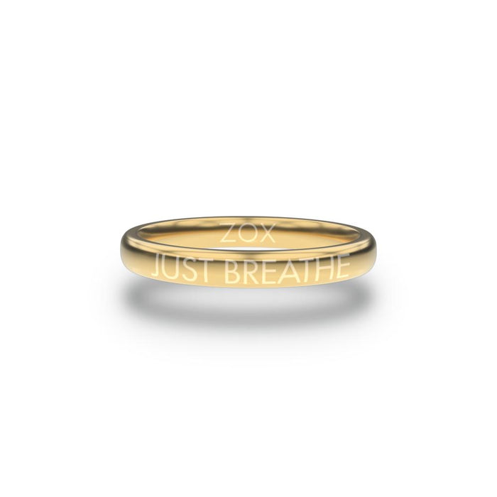 Front design of Just Breathe gold ring with sketched in text ‘Just Breathe’