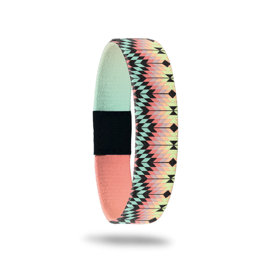 Wristband single is a tribal or southwestern design with colors of mint, light orange, lime green and variations. Inside is mint and orange gradient and says Keep Calm.