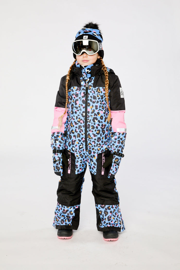 Child wearing the Deux par Deux TEKNIK one-piece snowsuit in blue leopard print, view 2
