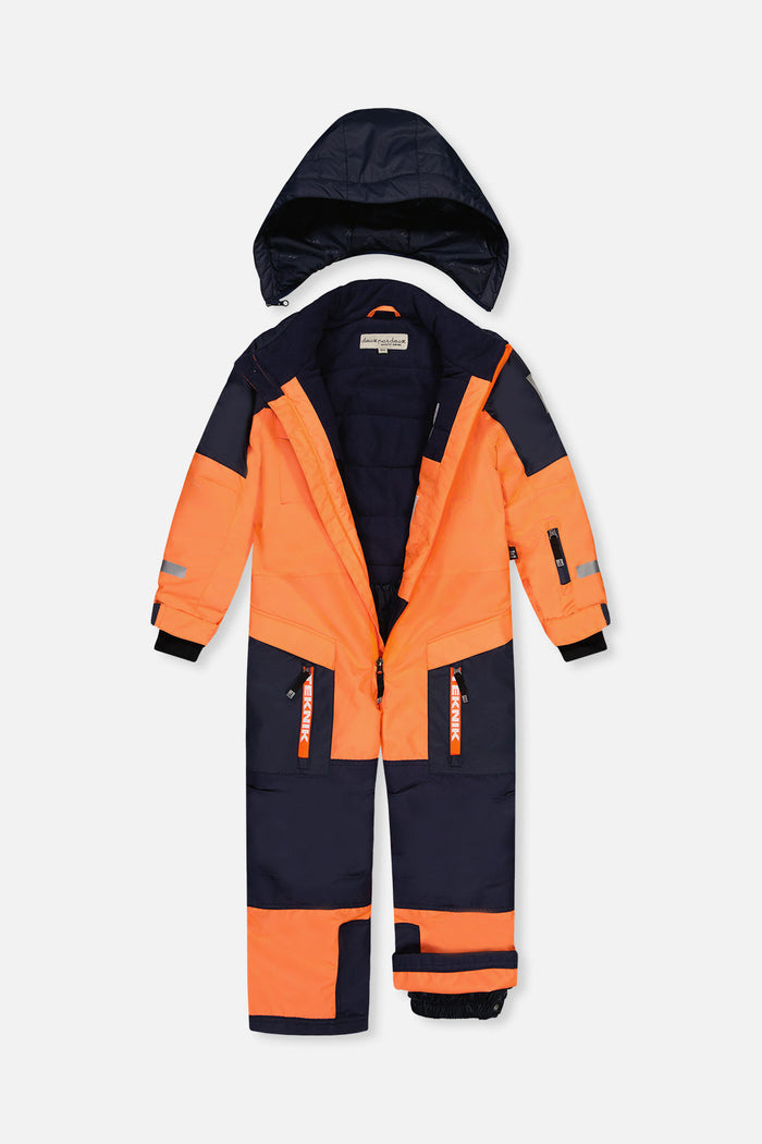 Bright orange and blue TEKNIK one-piece unzipped with the navy hood detached, showing the lining