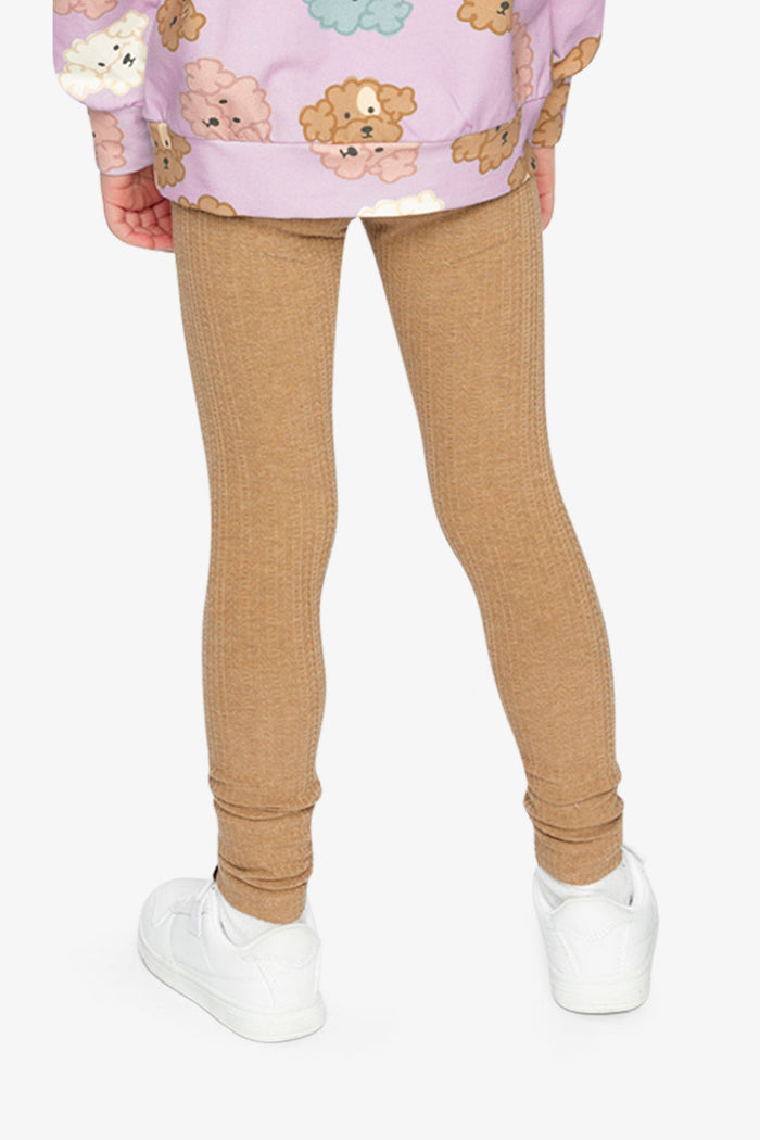 Child wearing the Deux par Deux brown chevron jacquard leggings, view 4