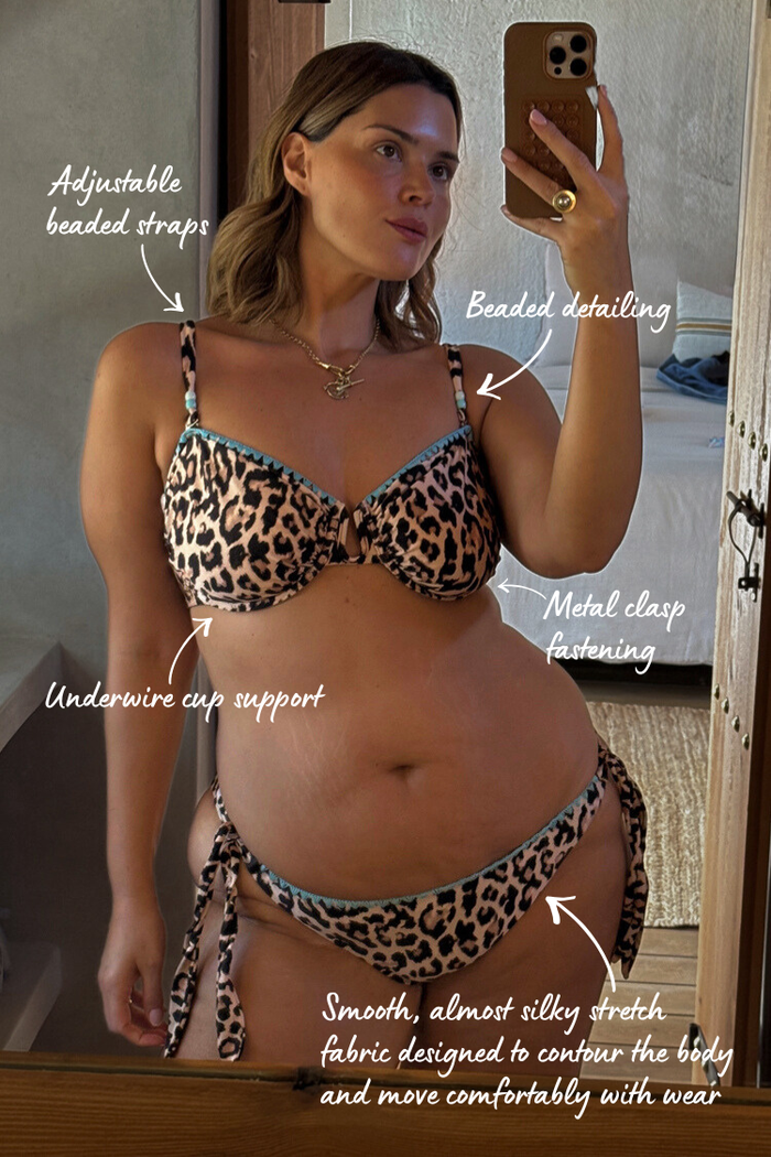 Leopard print underwired bikini with blue whipstitch trim and beaded straps, shown in an annotated mirror selfie.