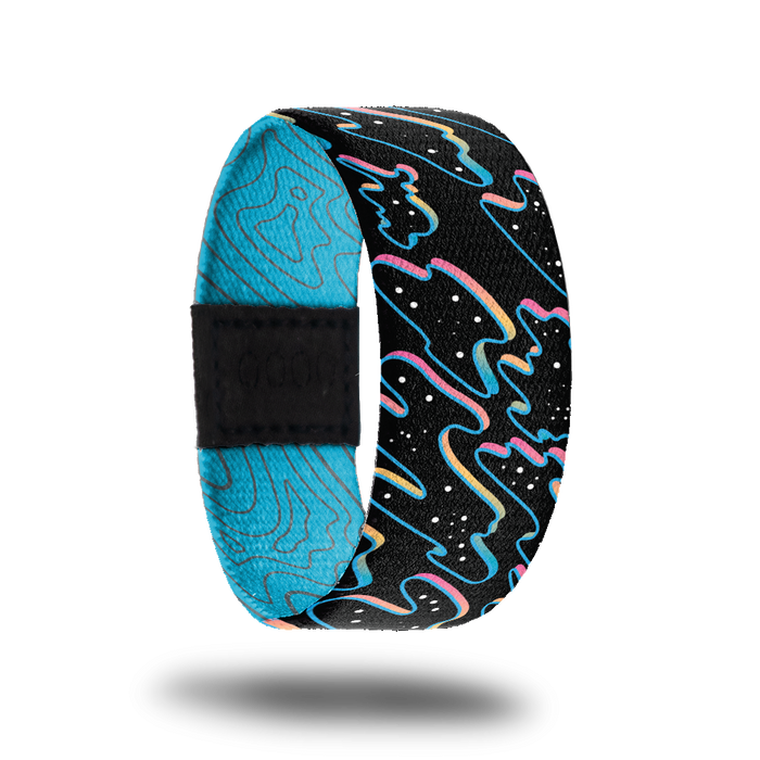 Outside design of Let Go. Black background with neon pink, blue, and yellow outlined paint puddles with black and white dots in the puddle shapes