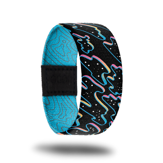 Outside design of Let Go. Black background with neon pink, blue, and yellow outlined paint puddles with black and white dots in the puddle shapes
